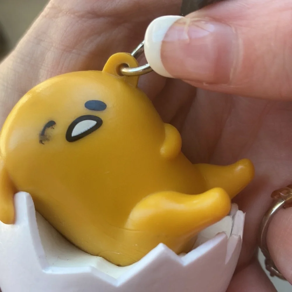 Gudetama keychain in good condition egg man